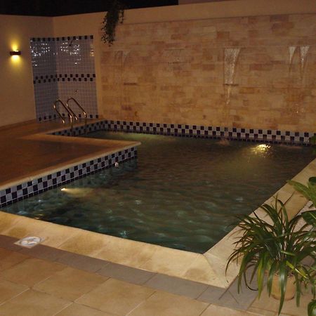 Olimpo Hotel & Suites Itaugua Bagian luar foto