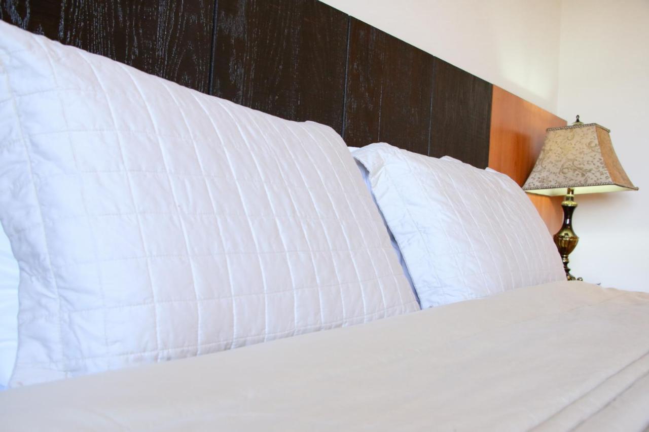 Olimpo Hotel & Suites Itaugua Bagian luar foto
