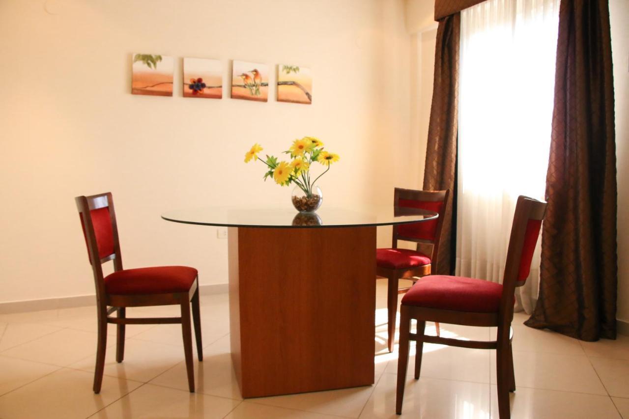 Olimpo Hotel & Suites Itaugua Bagian luar foto