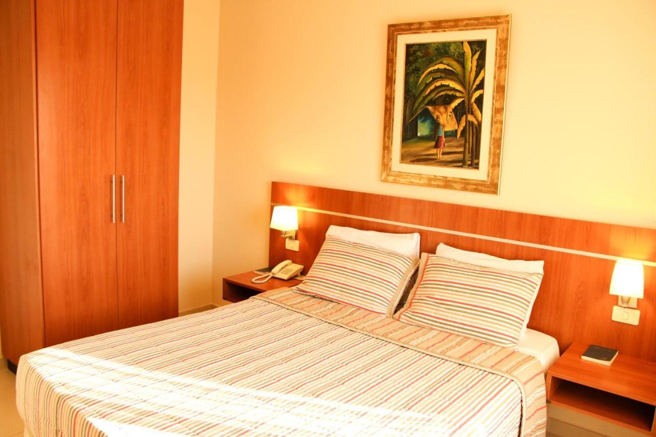 Olimpo Hotel & Suites Itaugua Bagian luar foto