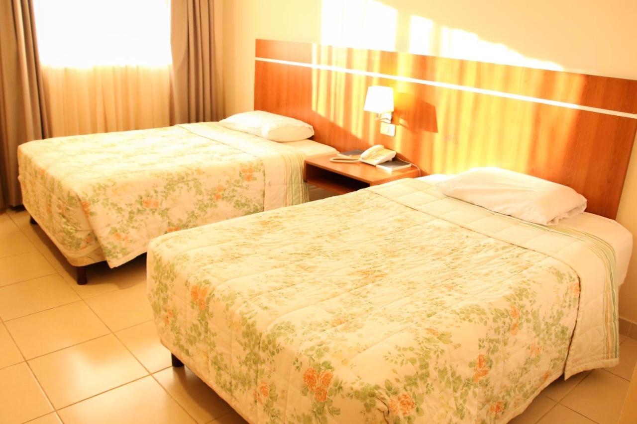 Olimpo Hotel & Suites Itaugua Bagian luar foto