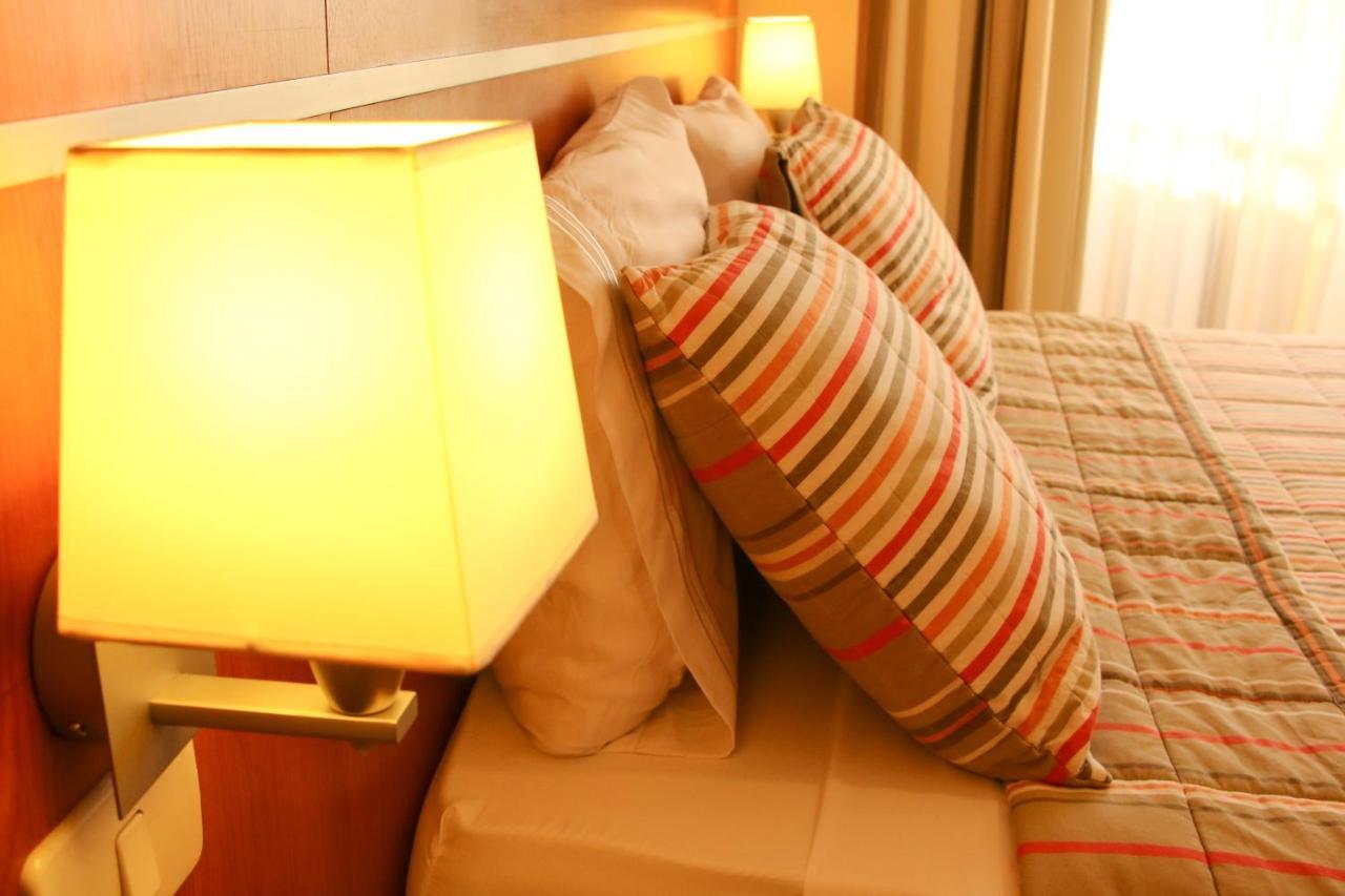 Olimpo Hotel & Suites Itaugua Bagian luar foto