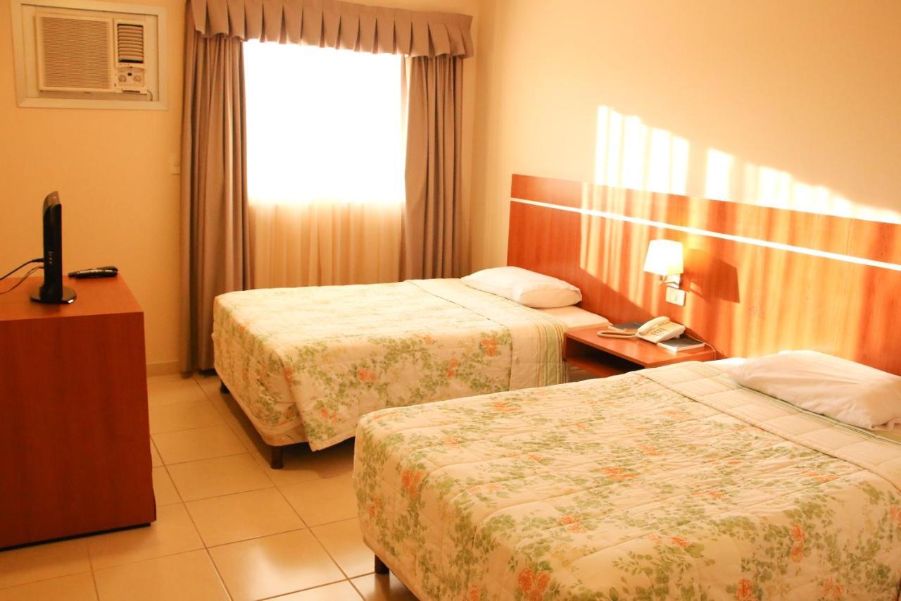 Olimpo Hotel & Suites Itaugua Bagian luar foto